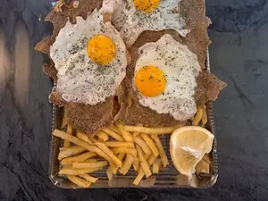 Suprema a caballo con fritas