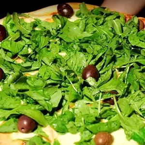 Pizza con rúcula