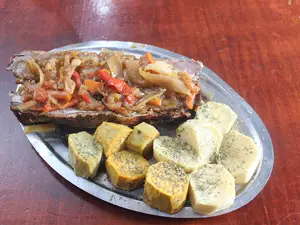 Vacio papas y batatas al horno