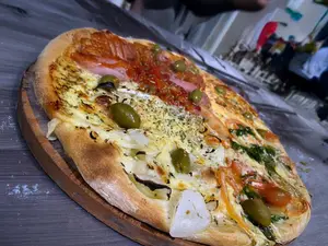 Pizza 4 gustos de 8 porciones