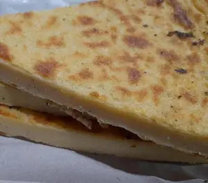 Porción de fainá rellena