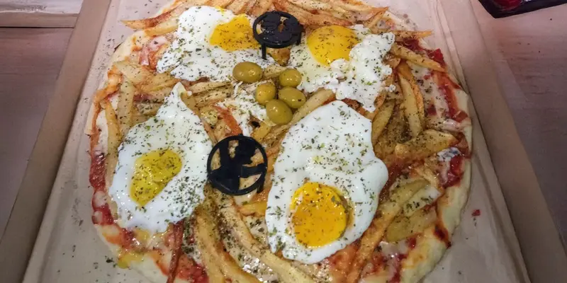 Pizzeria Cuatro Soles