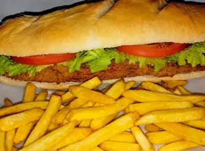 Sándwich milanesa lechuga tomate 2