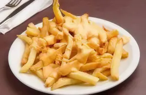 Papas fritas con cheddar