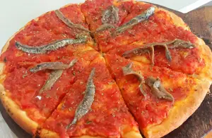 Pizza grande con anchoas