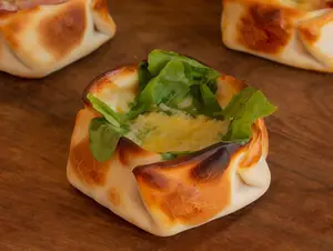 Rúcula Parmesano Y Oliva