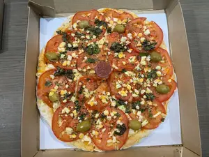 Pizza napolitana con huevo