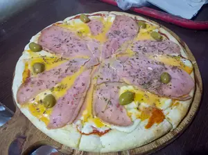 Pizza de panceta con cheddar