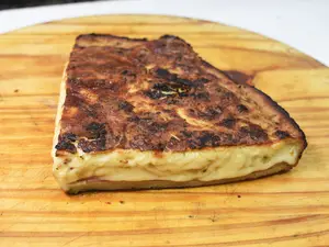 Fainá rellena porción