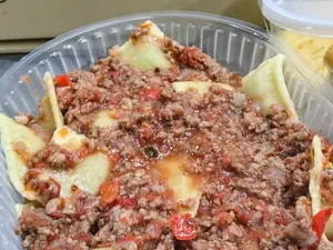 Raviolones verdura c/bolognesa