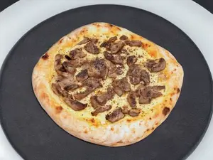 Muzzarella y hongos salteados