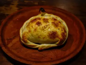 Empanada cebolla y queso