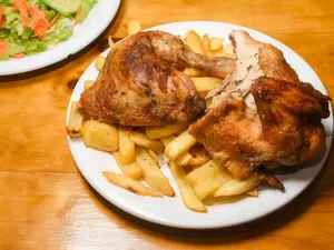 1/2 pollo brasa o broster