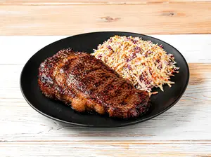 Bife de chorizo con guarnición