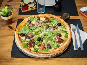Pizza con rúcula