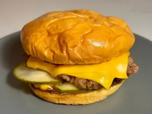 Cheesburger triple con papas