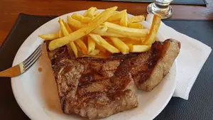 Bife de costilla con guarn