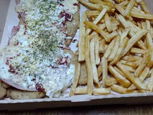 Mila de ternera jamón y huevo