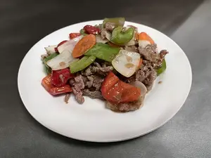 Cerdo con pimiento y jengibre