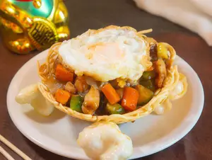 Pollo saltado al nido