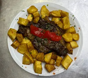 Ojo de bife con guarnición