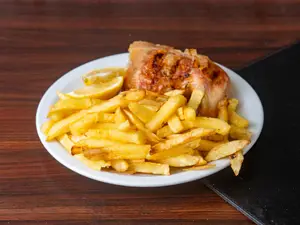 ¼ De Pollo. Incluye Guarnicion