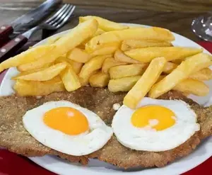 Milanesa A Caballo Con Guarnción