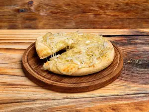 Pizza de fugazzetta al molde