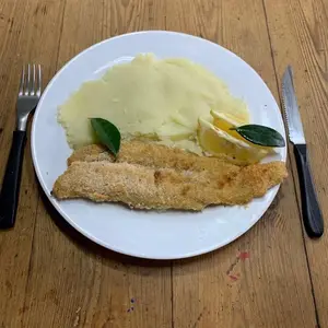 Filete de merluza con guarnición