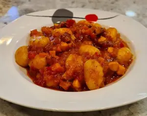 Ñoquis Con Salsa Bolognesa