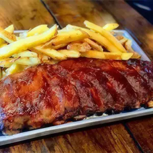 Ribs bbq con papas rústicas