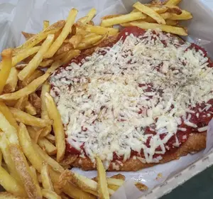 Suprema a la parmesana