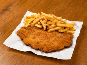 Milanesa carne con guarnición