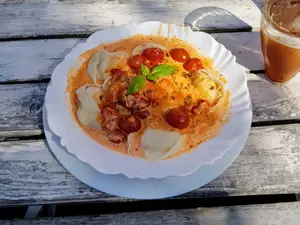 Ravioles con salsa a elección