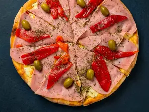 Pizza especial jamón y morrones porción