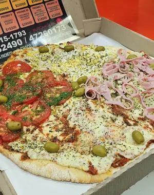 Pizza gigante 4 gustos a elecc