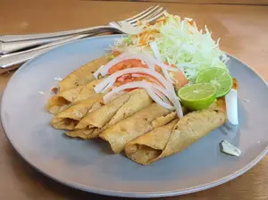 4 tacos dorados