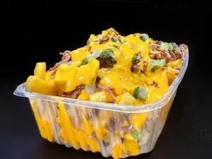 Papas cheddar bacon y verdeo