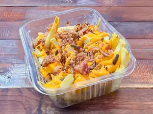 Papas cheddar y bacon
