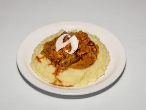Lomo Al Champiñon + Guarnicion