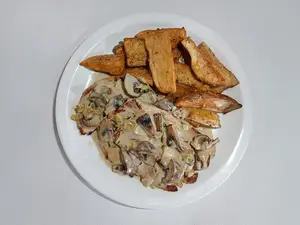 Pollo champiñon + guarnicion