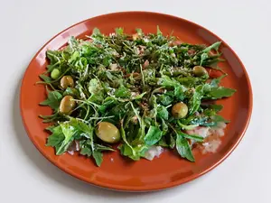 Pizza crudo y rúcula