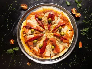 Pizza jamon y morrones individual