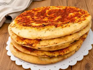 Prepizza de tomate x unidad.