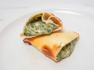 Espinaca y salsa blanca