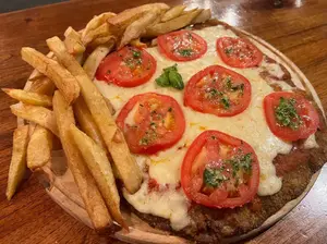 Milanesaxl napolitana c/fritas