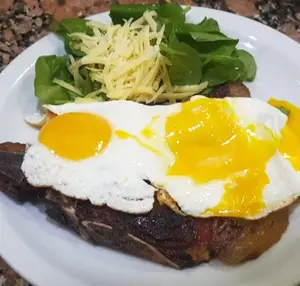 Bife de costillas con papas