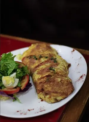 Omelette de jamón y queso