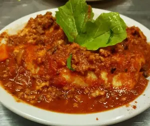 Ravioles a la boloñesa