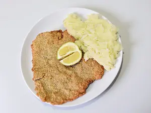 Suprema con papas fritas